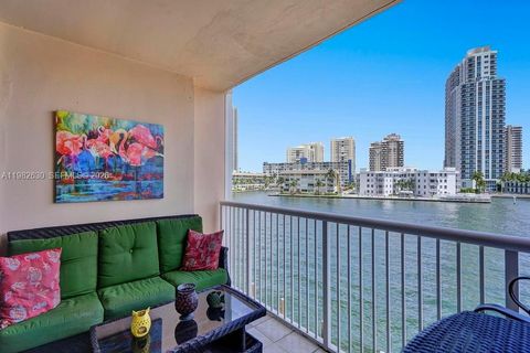 Photo of 121 Golden Isles Dr #205, Hallandale Beach, FL 33009 (MLS # A11982630)