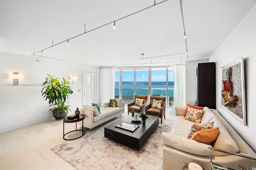 Experience luxury living on the 16th floor of the iconic Santa Maria. This upgraded flow-through residence offers 3,170 sq. ft. of interiors plus 1,250 sq. ft. of expansive terraces with panoramic views of the Atlantic Ocean, Biscayne Bay, and the Miami skyline. Features include a private foyer, 3 bedrooms, 4.5 baths, a grand primary suite with dual bathrooms and a remodeled and expansive walk-in closet, upgraded kitchen with Sub-Zero refrigerator & top of the line appliances. Includes laundry room, 2 parking spaces, and storage. Enjoy 5-star amenities: 24/7 security, valet, fitness center, tennis, racquetball, marina, pool, bistro, children’s playroom, and a historic mansion for private events.