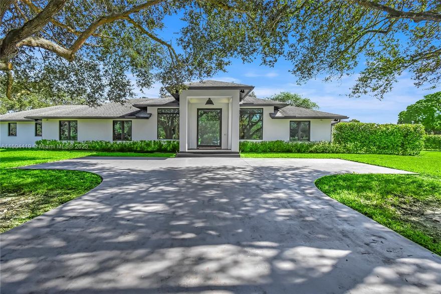 SPECTACULAR FULLY REMODELED SMART HOME SITTING ON 2.5ACRES IN ROLLING OAKS, SOUTHWEST RANCHES. Boasting over 5,000 SFT Adj. luxury living offers 4beds, 4.5baths/office & 4 car garage Renovations include: Roof (5years), in 2020: New floors, kitchen, closets, pluming & electric system, impact Windows, a/c & more. This smart home remotely controls from lighting to security cameras & more. The kitchen is a culinary masterpiece, built-in wet bar & wine fridge.A split bedroom plan, the master bedroom offers an elegant boutique-style closet & a luxurious master bathroom, the remaining rooms & office are located on the other wing.The outside encompasses a paradise of lush landscaping.This residence seamlessly combines elegance w/ functionality.Welcome home to a life of luxury in Southwest Ranches.
