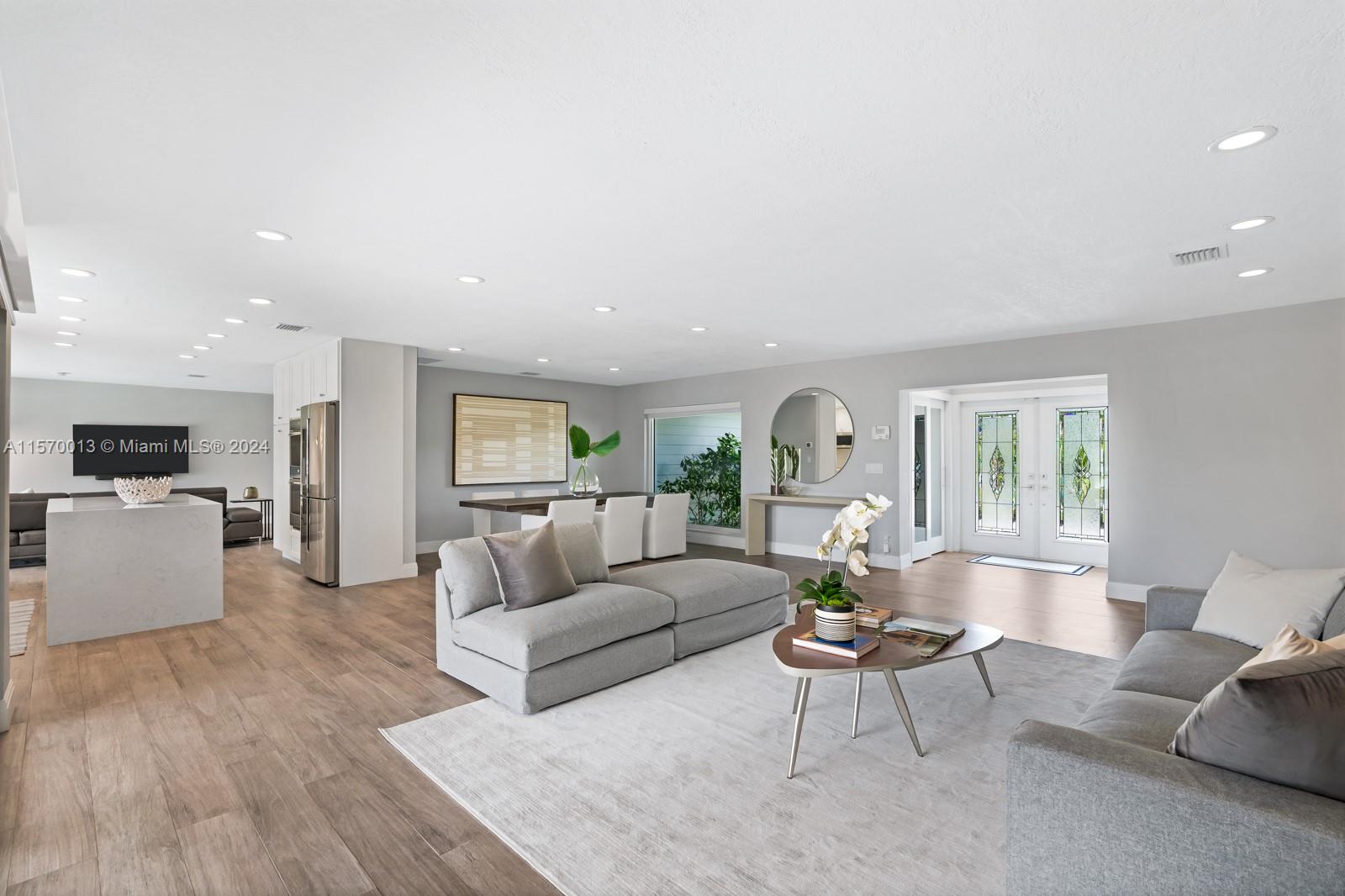 Live well in this beautifully renovated home in Boca Harbor. Nestled at the end of the canal and elevated, you are able to enjoy green space as well as a TRUE WATER VIEW down the canal as soon as you walk in the door. The primary suite is thoughtfully designed with a walk in closet, 2 vanities, and direct access to the pool. Entertain with opening the sliding accordion glass doors that seamlessly connect the indoor and outdoor spaces. With Impact Windows and doors throughout, solar panels, a Crystal-clear water filtration system, battery powered backup generator, roof that is only 9 years old. Offered Partially furnished. NO HOA!! Property is in pre-foreclosure.