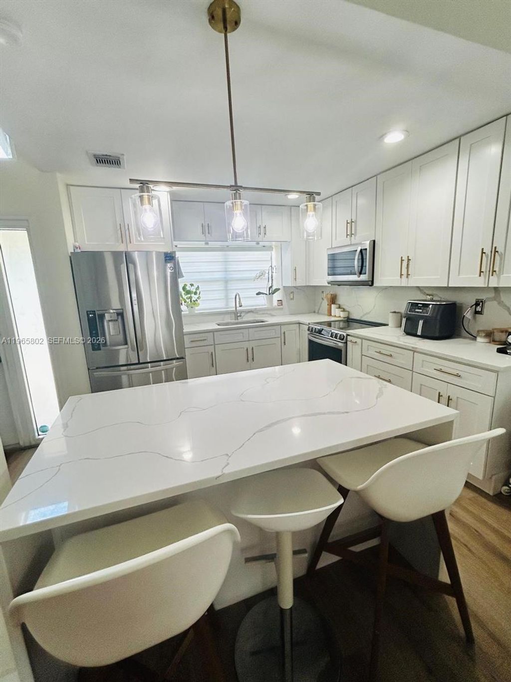 Photo of 7342 NW 38th Pl, Coral Springs, FL 33065 (MLS # A11965802)