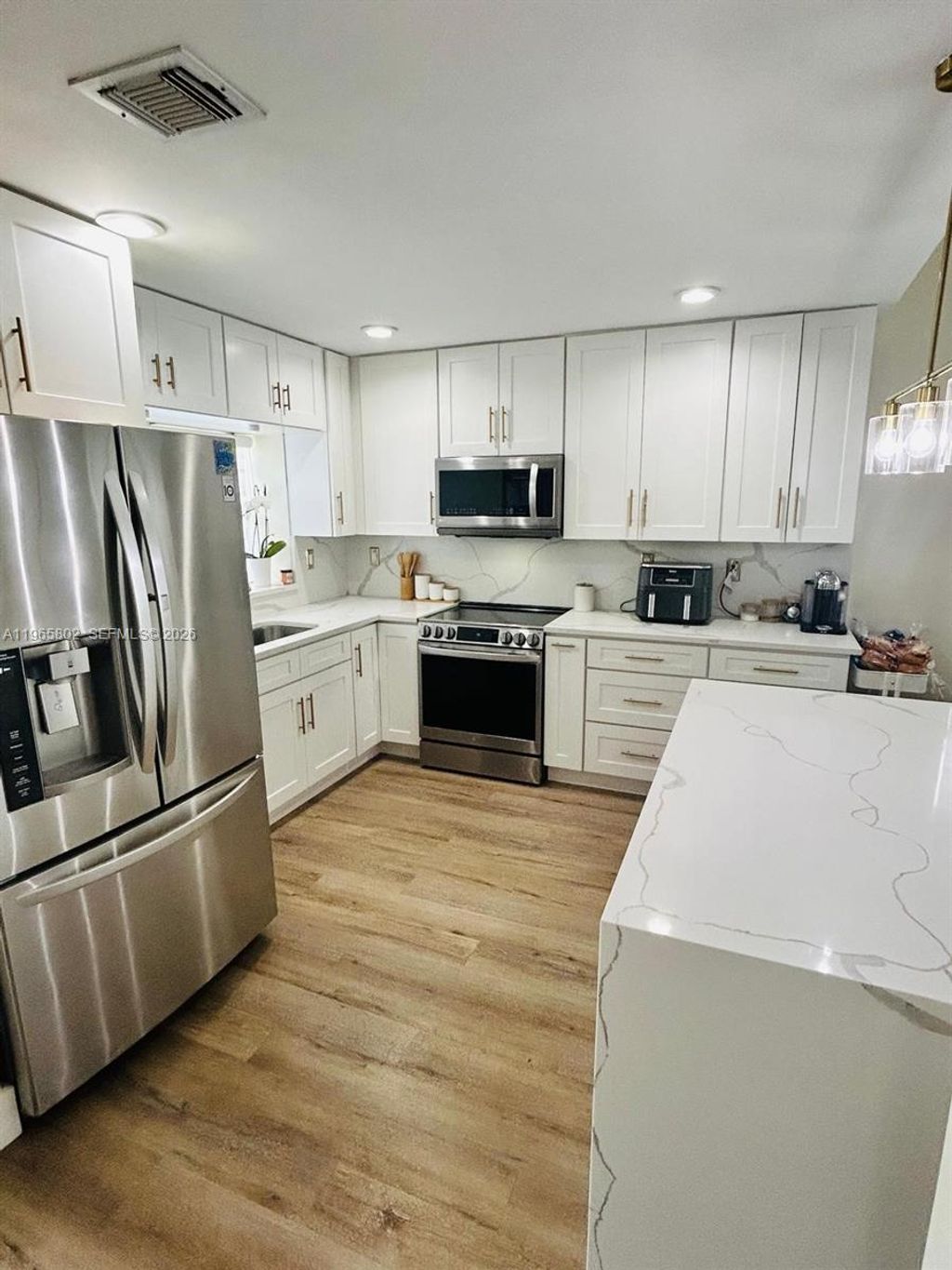 Photo of 7342 NW 38th Pl, Coral Springs, FL 33065 (MLS # A11965802)