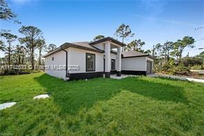 Property for Sale at 107 W 11th St, Lehigh Acres, Lee County, Florida - Bedrooms: 3 
Bathrooms: 2  - $349,999