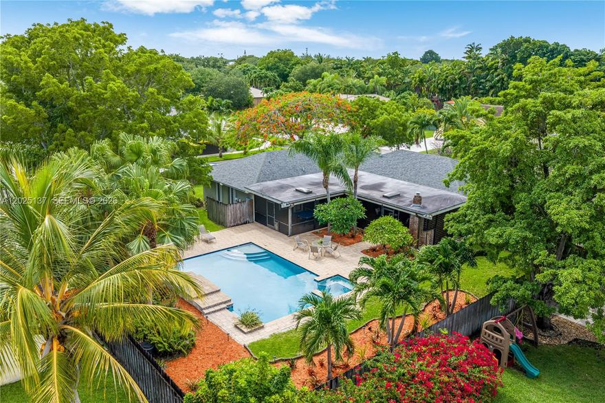 *Tucked away on a quiet street in a centrally located neighborhood just west of Miami Dade College, this spacious 4-bedroom, 2-bath home offers the perfect blend of comfort, functionality, and convenience. Ideally situated between Kendall Drive and SW 104th Street, this location provides easy access to shopping, dining, major highways, schools, and everyday amenities while still offering the tranquility of an established residential setting with mature trees and sidewalks. *Designed with a desirable split-bedroom floor-plan, the home features a main suite on one side of the house with patio access & 3 BRs, a full pool bath and open den on the other. *The large screened-in patio complete with a built-in gas grill and expansive countertop/bar is perfect for entertaining or enjoying outdoor living year-round. *Continue outside to a spacious pool deck, and ample yard space with room to relax, play, garden or taking a dip in the large inviting pool that has a built in 'cozy corner' spa with jets (not heated).  *The laundry/utility room is located in a pocket area off the garage that lends itself to a possible enclosure by adding doors with a mini-split AC unit for comfort.  *Additional highlights include a 2-car garage, accordion shutters, panels for front door, & an approved impact resistant garage door.  *A wonderful opportunity to own a well-located home with great indoor and outdoor living spaces in the heart of East Kendall. USE THE ZIP CODE 33176 WHEN USING GPS.