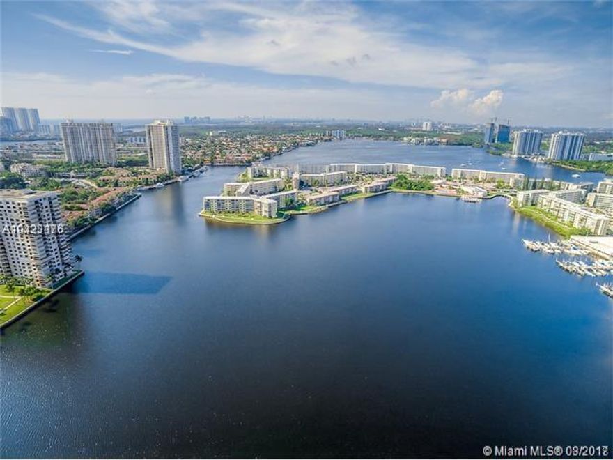 Amazing Ocean & City view ,Corner unit 1693 SQFT  Split 2/2, fully renovated.  Building with great amenities like a resort: 2 pools,  tennis courts, mini golf, BBQ, in prime location at Williams Island Boulevard walking distance to cafes, restaurants, bank, shops, Super Market and more.  Partially Furnished, living room and dinning room, with buffet room + TV stand for den . Basic Cable .  Water Included. 1 assigned parking and 1 guest parking.  A+ Schools.