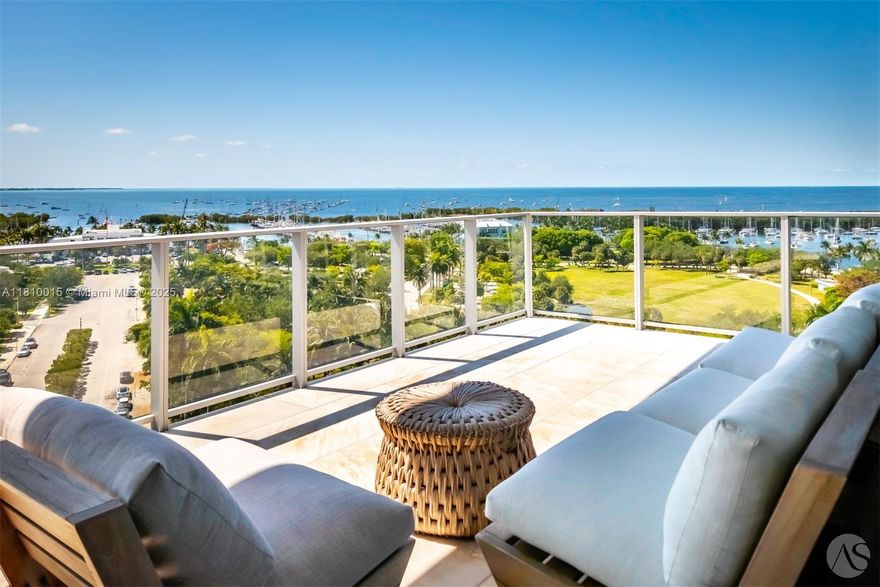 Discover this Boho-Chic Paradise in the Sky at Grove at Grand Bay. This exquisite decorated residence, fully furnished 4-bedrooms with en-suite bathrooms, an office/staff quarter with en-suite bath, and powder room all enhanced with high-end finishes, automated lighting, and blinds. Marble floors throughout and wide-plank wood floors in all bedrooms. Soaring 12-foot ceilings create an airy ambiance, while the 12-foot-deep wrap-around terrace with a summer kitchen offers stunning bay views and seamless indoor-outdoor living. One of only 40 exclusive residences in the South Tower, this home includes access to world-class amenities: a gym, spa, butler service, 24-hour concierge, pet spa, and a rooftop pool. Waterfront luxury redefined.