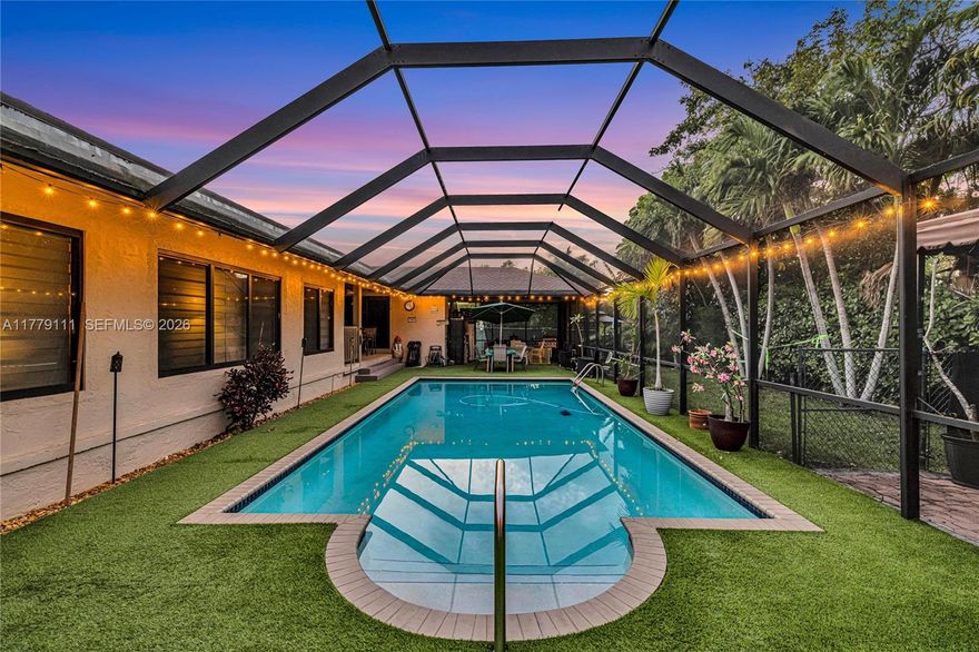 An exceptional opportunity to own a substantially larger home than others in its class in sought-after Palmetto Bay. Offering nearly 4300 total sqft this residence delivers space and flexibility rarely found in comparable 4-bedroom homes. The main home features 4 generously sized bedrooms and 3 full bathrooms with a desirable split floor plan, a home office, a separate 1BD/1BA guest suite with its own private entrance and driveway provides true multigenerational living or guest accommodations. The expansive kitchen is ideal for entertaining, with abundant cabinetry, counter space, and a large center island. Outdoor living is enhanced by a heated saltwater pool/ BBQ area creating a private retreat. A compelling blend of size, functionality, and value.