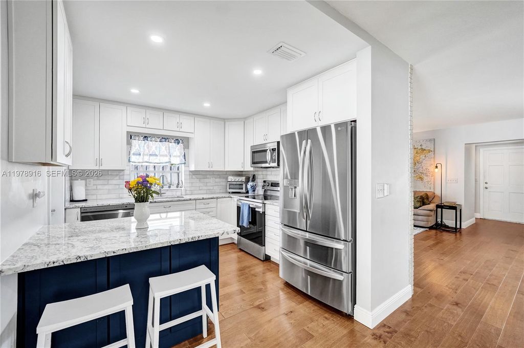 Photo of 4621 NE 2nd Ave, Oakland Park, FL 33334 (MLS # A11978916)