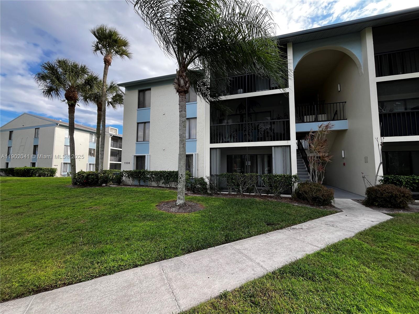 No stairs or elevator on this ground floor value that includes tile throughout and updated bathrooms. New hot water heater, screened patio, and accordion hurricane shutters within a gated community for your peace of mind.   Enjoy the community pool, tennis, clubhouse and walking trail along the large scenic and peaceful lake.