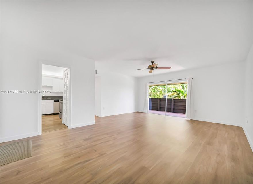 Location, Location, Location. Just steps away from Dadeland Mall, Target, Dadeland & North Metrorail Station. This spacious apartment features a garden view from a large, tiled, covered balcony, accessible from the living/dining area and both bedrooms. The kitchen has been refurbished with new appliances, freshly painted throughout, and new vinyl wood flooring. The master bedroom boasts a walk-in closet and a  tiled shower. The community offers a clubhouse, pool area, two tennis courts, and beautiful garden landscaping surrounding the buildings.