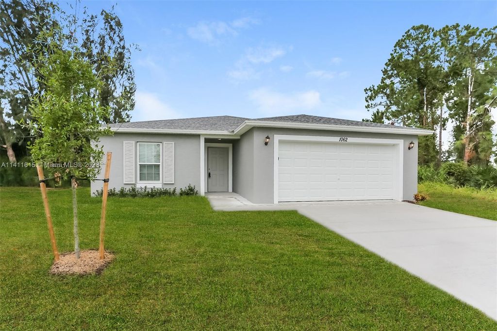 Photo of 1062 SW Fenway Rd, Port Saint Lucie, FL 34953 (MLS # A11411615)