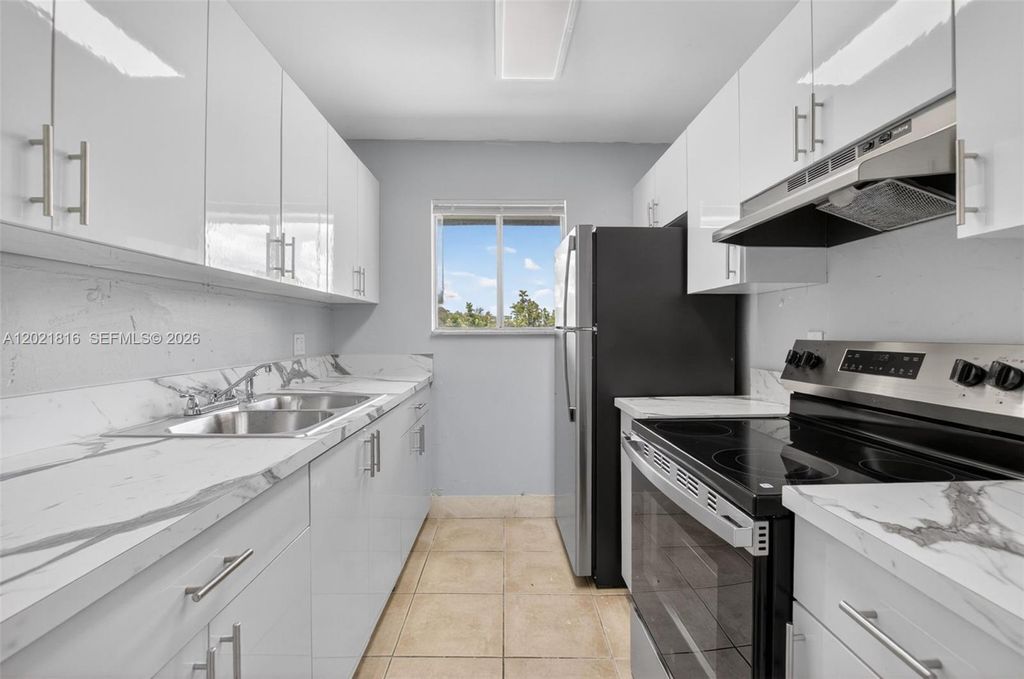 Photo of 2201 Catherine Dr #3, Delray Beach, FL 33445 (MLS # A12021816)