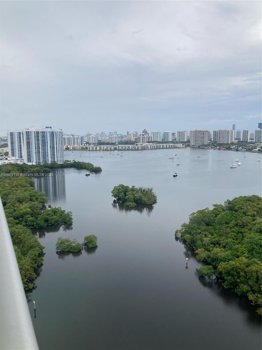 Enjoy an obstructed water view from this 24 floor modern condo with 2 Beds, 2 Baths + Den, private elevator with quality finishes and modern appliances. You can relax looking the sunrise and sunset from your large balcony and enjoy the breeze from the ocean. Washer & Dryer inside the unit. The building offers 24 hours valet parking, Security, service of Dry clean and laundry, concierge, Spa, Sauna, State of Arts Fitness Center, Pool, Jacuzzi, Cabanas, Massage room, Soccer court ,Squash room, Tennis Court, Kid's paly room, BBQ area, kayaks, paddle boards and more. Just a few minutes from Sunny Isles Beach, Aventura Mall, Oleta Park and more.