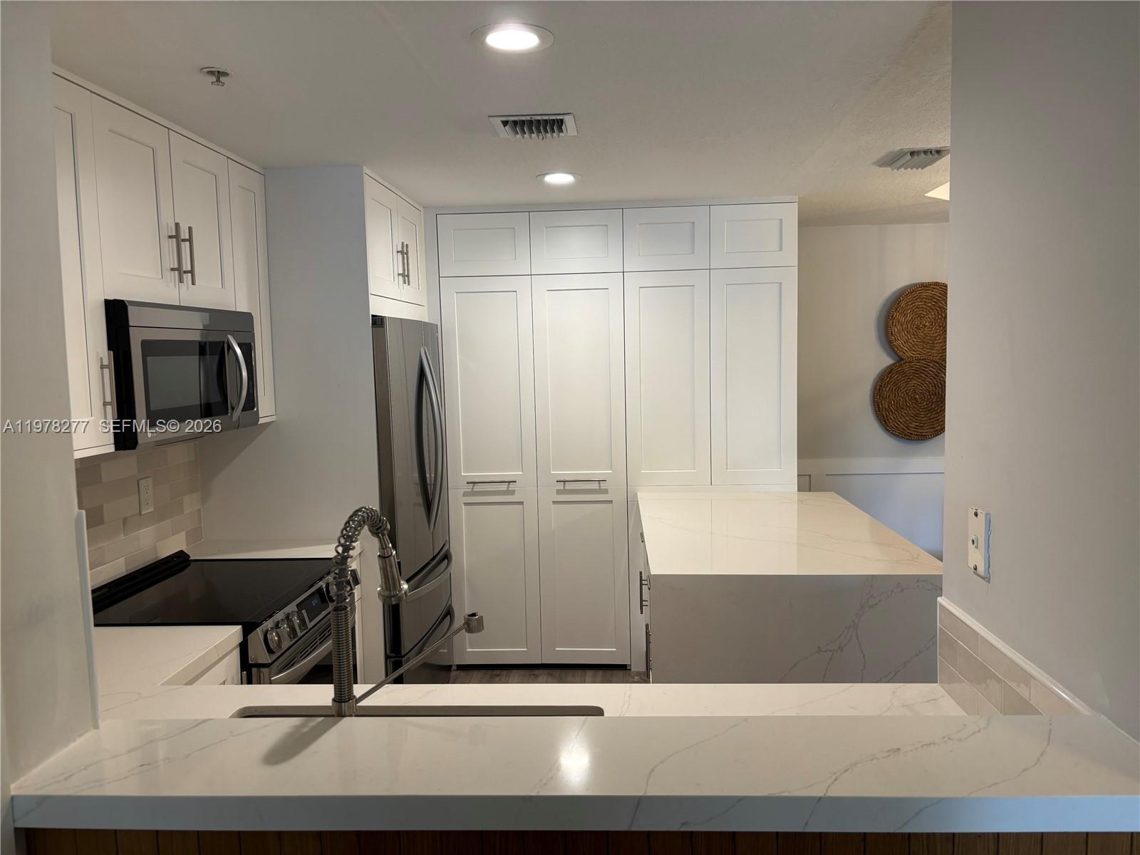 THE COURTS AT DORAL ISLES - Residential Lease