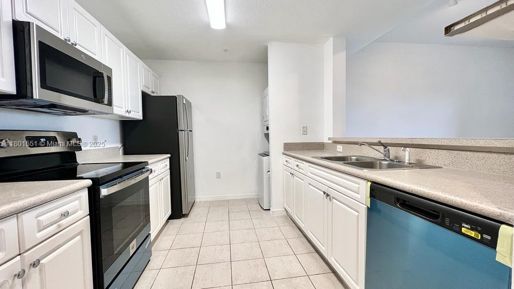 Beautiful 1BR/1BA condo with one assigned parking space, offering stunning open views overlooking Roger Dean Stadium! This bright, sunlit unit features high ceilings and a balcony with panoramic views. Freshly painted and move-in ready, it boasts an open kitchen with new stainless steel appliances and wood laminate flooring throughout. The spacious bedroom includes three large closets for ample storage. Located in a high-end community with resort-style amenities such as a clubhouse, fitness center, pool, and spa—just 10 minutes from the beach. Basic cable and Wi-Fi provided by HOA and included in rent. Don’t miss this opportunity! ANNUAL LEASE ONLY