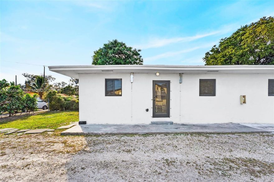 Newly and fully renovated, this 2-bedroom, 1-bath residence offers modern comfort and privacy as one half of a well-maintained duplex in a centralized Miami location. The bright interior features tile floors, a full kitchen with updated appliances, and an in-unit washer and dryer for everyday convenience. Complete impact windows and doors provide added peace of mind, while the fully fenced property enhances privacy. Enjoy two dedicated parking spaces directly in front plus additional guest parking. Water, sewer, trash, and lawn maintenance are included. Owner-occupied neighboring unit. No flood zone and easy access to I-95, shopping, and daily essentials.