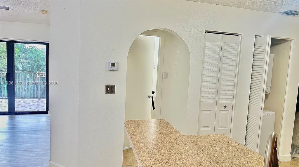 Photo of 10135 W Sunrise Blvd #304, Plantation, FL 33322 (MLS # A11961230)