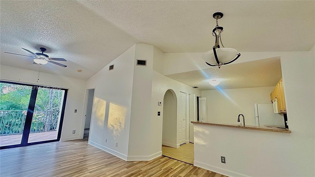 Photo of 10135 W Sunrise Blvd #304, Plantation, FL 33322 (MLS # A11961230)