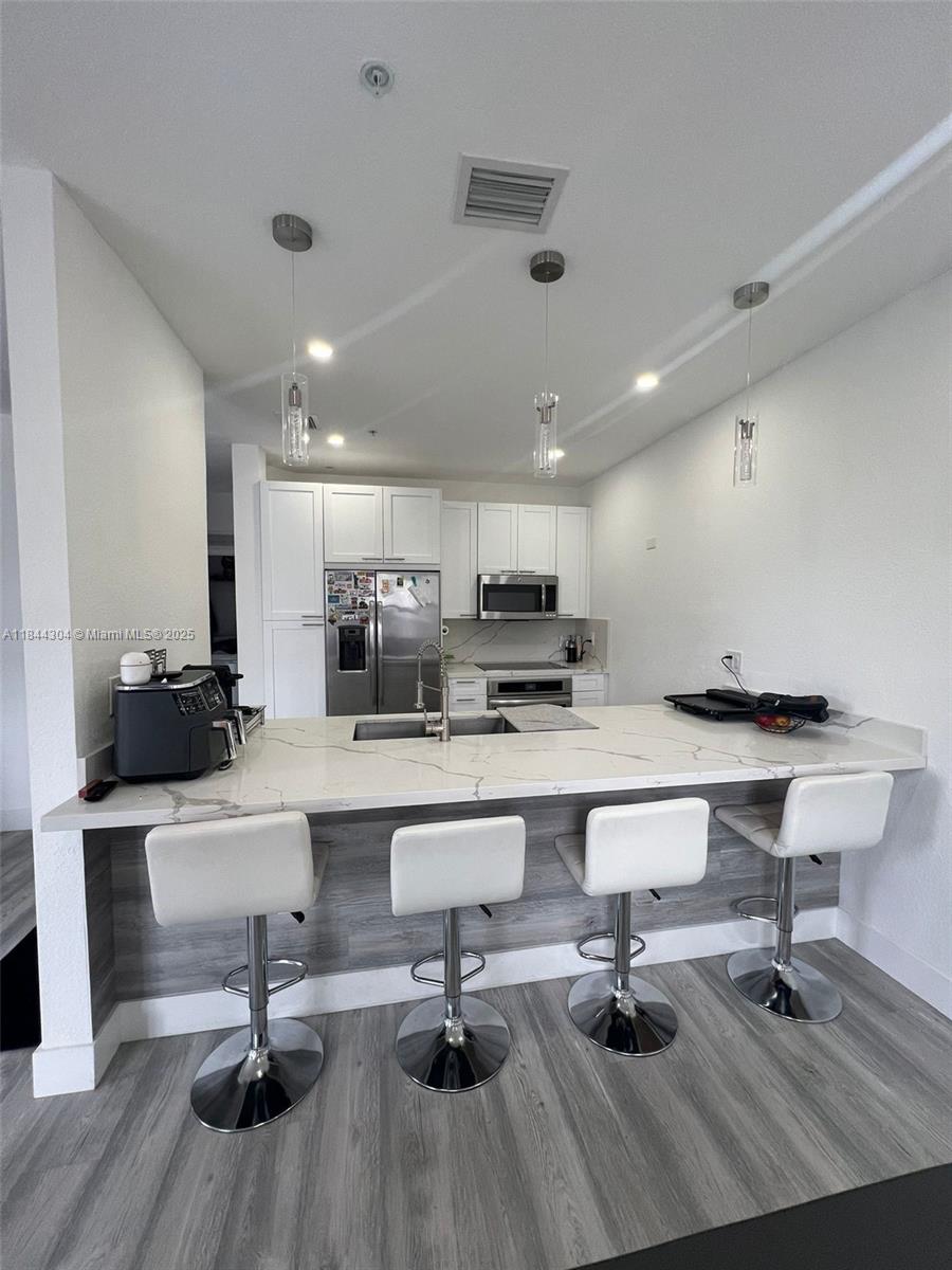 Welcome to this stunning 3-bedroom, 2.5-bathroom apartment located in the highly sought-after area of Doral. Situated in a prime location, this residence offers the perfect blend of modern living and convenience. The apartment has undergone a full renovation, showcasing contemporary design and high-end finishes throughout. With spacious bedrooms and well-appointed bathrooms, it provides a comfortable and stylish living space. One of the highlights of this property is its exclusive access to a prestigious country club.