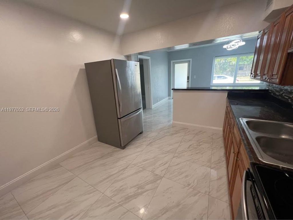 Photo of 18 Miami Gardens Rd, West Park, FL 33023 (MLS # A11977052)