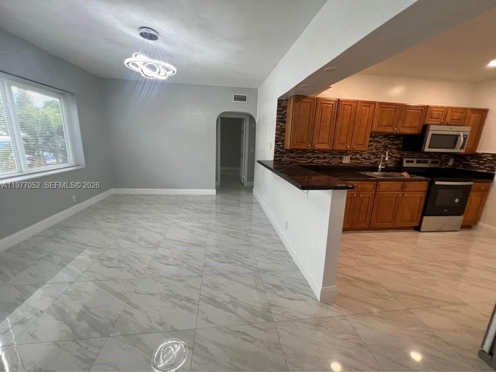 Photo of 18 Miami Gardens Rd, West Park, FL 33023 (MLS # A11977052)