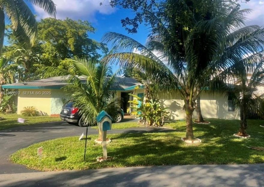 WATERFRONT HOME. OVERSIZED LOT. LOW $150 ANNUAL HOA. Close to Beaches, 2 Intl Airports, Downtown Davie, Cruise Ports, Hard Rock Stadium & less than 2 miles to Nova Southeastern Univ (NSU) and HCA Florida Univ Hospital. Spacious Home in LAKESHORE RANCHES is a Hidden Gem.  Split-plan 3 Beds, 2 Baths. Kitchen & Family Rm separated from the Living Rm & Formal Dining Rm.  Kitchen Whirlpool Energy Star appliances, Maytag Washer & Dryer, AND Plantation Shutters are included.NEW WATER HEATER OCT 2025 & AC 2023. Access your backyard 3 ways, Via Sliding doors from your Dining/Living Rm, from your Kitchen/Family Rm, AND from your PRIMARY SUITE.  Relax in your Lanai, Enjoy Water Views, Easy-care landscaping, & DAILY Fishing, Kayaking, Swimming etc.  AMAZING OPPORTUNITY.