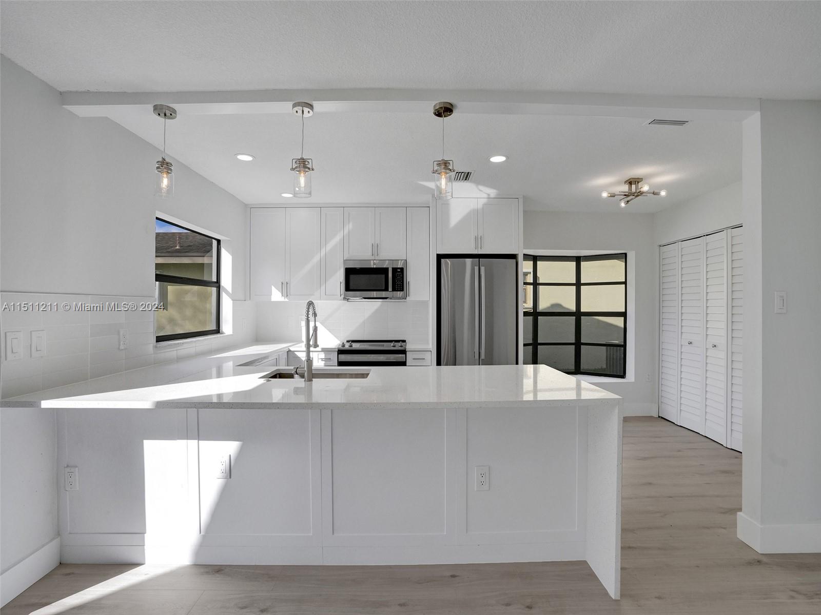 Prepare to be wowed by this stunning 3-bedroom, 2-bathroom gem, completely reimagined with modern flair and functionality. From the moment you step inside, you'll be greeted by an abundance of natural light that floods the open-concept living space, and dine-in kitchen. Two contemporary bathrooms, featuring modern fixtures and a luxurious feel. Step outside and enjoy the fresh air on your private back yard patio, perfect for barbecuing with friends or simply soaking up the sun. Conveniently located near shops, restaurants, great schools, and parks, this home offers the perfect blend of peace and accessibility. Tenants can enjoy the benefits of the Bonaventure Town Center Club. First month's rent & two security deposits required.