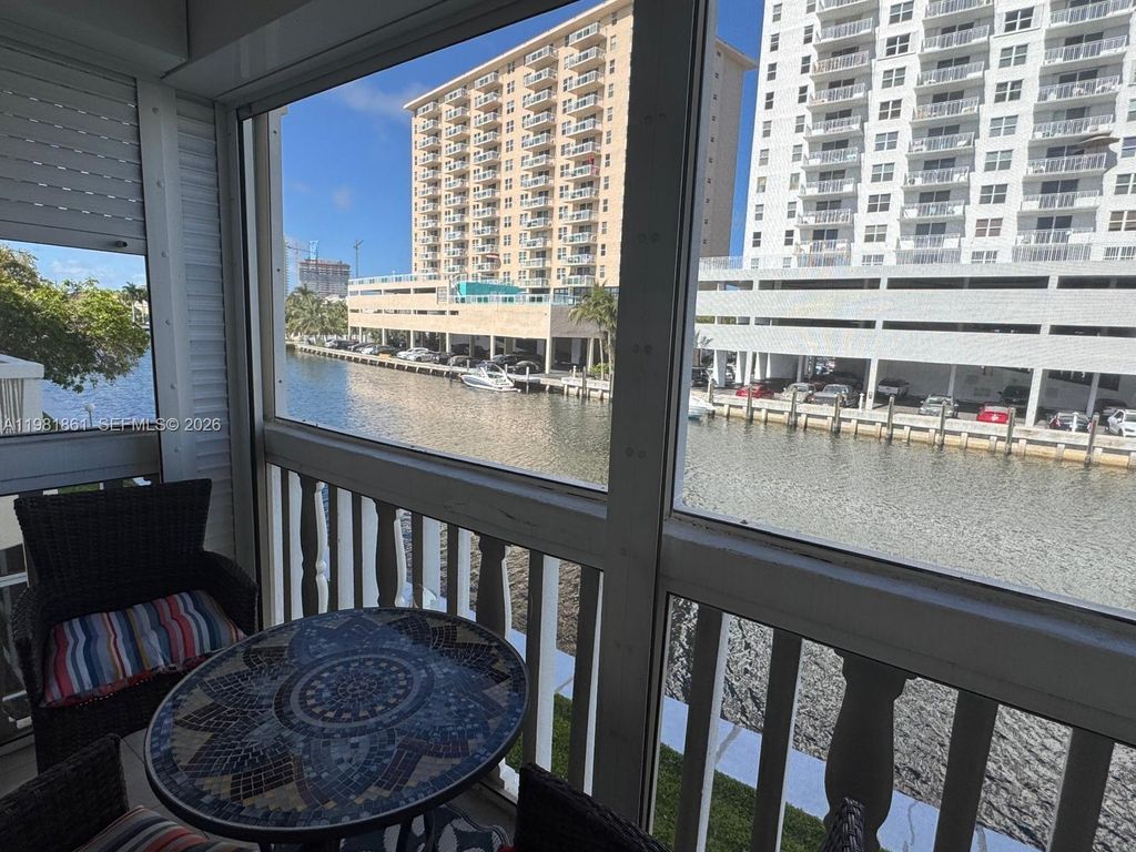 Photo of 450 Paradise Isle Blvd #209, Hallandale Beach, FL 33009 (MLS # A11981861)