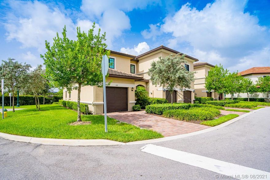 CORNER UNIT! STUNNING 3 bedroom, 2.5 bath BRIGHT "RARELY ON MARKET" two-story townhouse centrally located near park, excellent restaurants, and shops. Bedrooms and laundry are conveniently located on the second floor. Few minutes to the beach and 15 minutes to the airport. Wood cabinets and granite counters highlight the beauty of the open kitchen with GE Profile stainless appliances. Large garage plus driveway and lots of guest parking. Large master bedroom with french doors and two closets plus one extra in the master bath and two large other bedrooms with own bathroom. The covered and private patio is great for a BBQ or just relaxing. IMPACT WINDOWS throughout. Amenities include a pool on a private lake with a running/walking path.