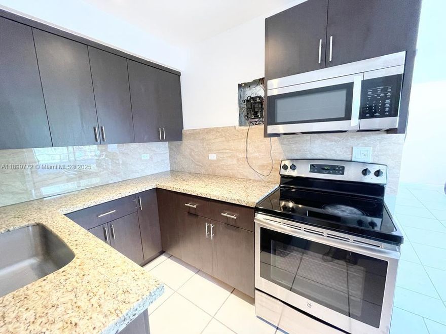Live just 500 feet from the pristine sands of North Beach Oceanside Park in this bright and beautifully updated apartment. Featuring a modern kitchen with sleek granite countertops and stainless steel appliances, this spacious unit also offers a fully renovated bathroom with contemporary finishes. The open and airy layout is filled with natural light, highlighting the charm of both the living area and the generously sized bedroom. Enjoy the convenience of an on-site laundry room and the unbeatable location — perfect for beach lovers and parkgoers alike. A true coastal gem!