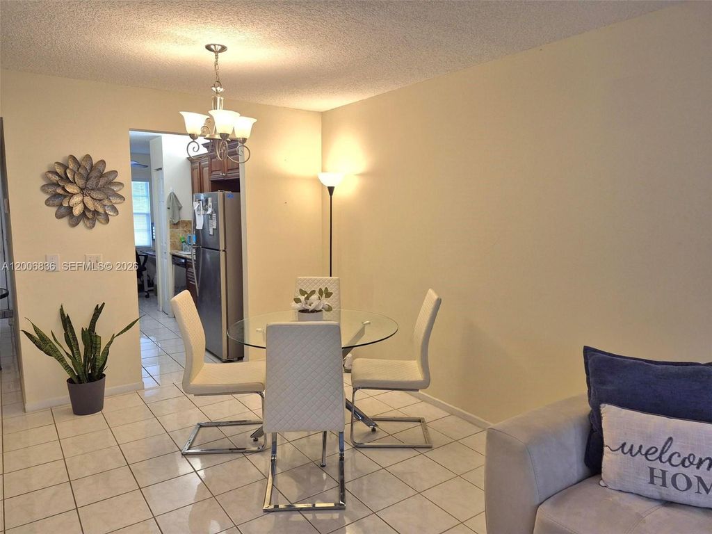 Photo of 12501 SW 14th St #209R, Pembroke Pines, FL 33027 (MLS # A12006836)