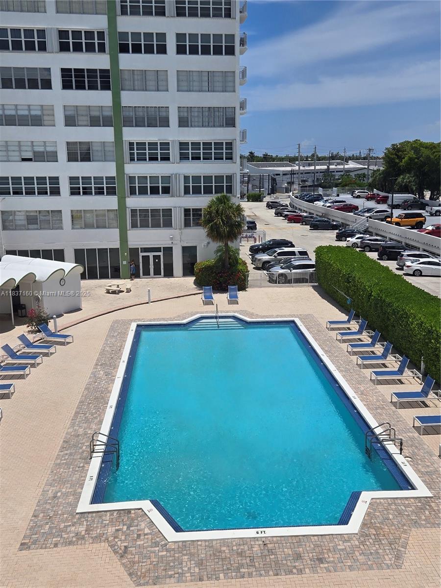 Experience waterfront luxury in this spacious 1,188 sq ft condo boasting stunning bay views from every room. This beautifully updated 2-bedroom, 2-bath residence features an open floor plan and a remodeled kitchen, ideal for entertaining. Enjoy breathtaking sunrises on your private balcony overlooking the tranquil water, then unwind with resort-style amenities in this gated community, including an Olympic-size heated pool, sauna, gym, library and lounge. Water, cable and high-speed internet are included, and the unit comes with an assigned parking space in a secure garage, with visitor parking available. Conveniently located just off Biscayne Blvd with easy I-95 access, you’re minutes from top dining, shopping and attractions like Haulover Park and Bal Harbour Shops. Assigned parking #191