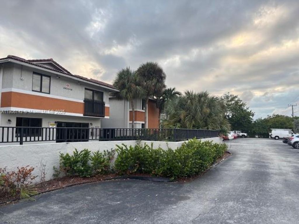 Photo of 10592 Royal Palm Blvd #10592, Coral Springs, FL 33065 (MLS # A11906742)