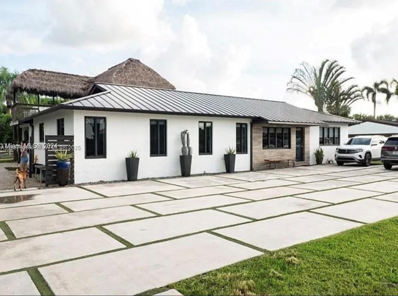Experience the perfect blend of privacy, comfort, and opportunity with this exceptional and versatile property. Ideal for those who crave space and serenity without sacrificing convenience—just minutes from the energy and excitement of Miami. The main home offers 3 generously sized bedrooms and 3 full bathrooms, designed for both relaxation and functionality. A separate 1-bedroom, 1-bath in-law suite provides added flexibility—ideal for extended family, guests, or additional rental income. Whether you're searching for a forever home, a retreat, or a smart investment, this property checks every box. Don’t miss this rare opportunity to own a property with endless potential. Seller contribution is available.