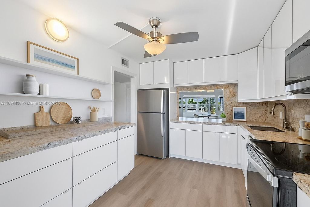 Photo of 3111 NE 51st St #202C, Fort Lauderdale, FL 33308 (MLS # A11899638)