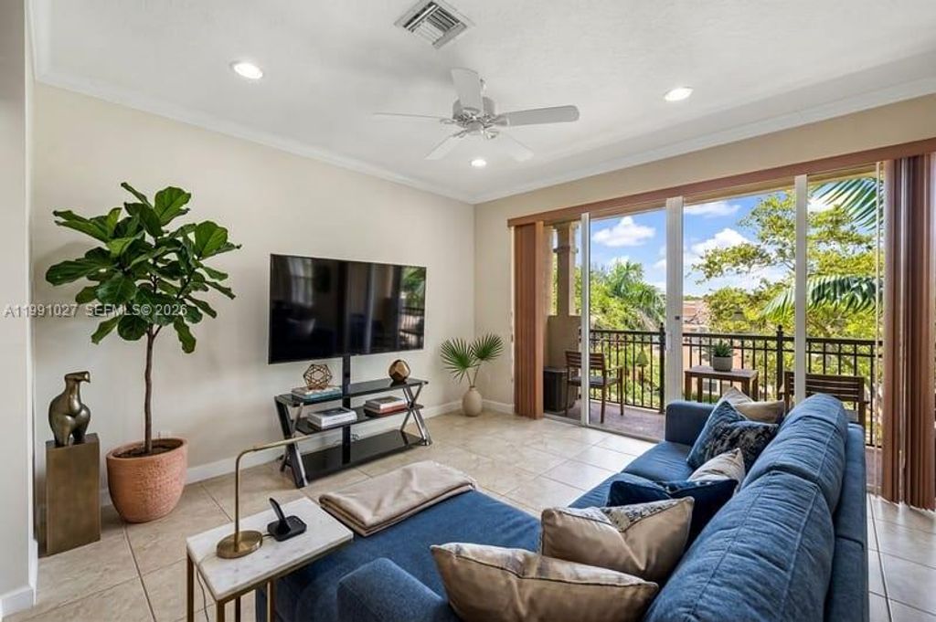 Photo of 3055 NW 126th Ave #303, Sunrise, FL 33323 (MLS # A11991027)