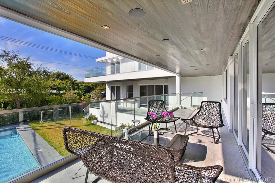 Magnificent tri-level home built on an oversized 10,480 sq. ft. lot in a great location in Key Biscayne. This ultra modern home offers top of the line finishes throughout & the latest technology. This house brings true comfort with generous spaces in its 6B/6B/2HB, superior gourmet kitchen, formal dining room & spacious living room, all surrounded by ample terraces overlooking the pool area. Enjoy unique covered patio area ideal for BBQ, rooftop to enjoy sunset cocktails and much more! Owner financing.