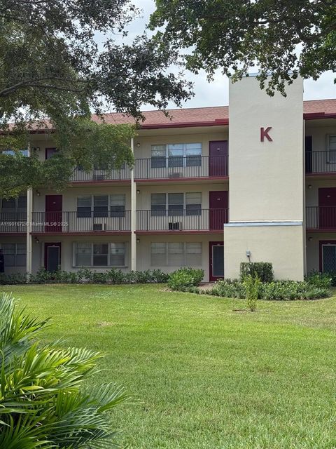 Photo of 100 SW 132nd Way #205K, Pembroke Pines, FL 33027 (MLS # A11901672)