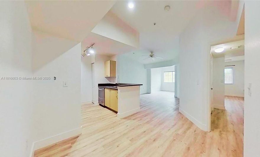 Located on the 3rd floor, this unit features wood flooring and high vaulted ceilings. Inside, you'll find a fully equipped kitchen with stainless steel appliances with washer and dryer. The community offers resort-style amenities, including two pools, a jacuzzi, BBQ area, jogging trails, lakes, a gym, and much more. NO association approval required. FAST MOVE IN
