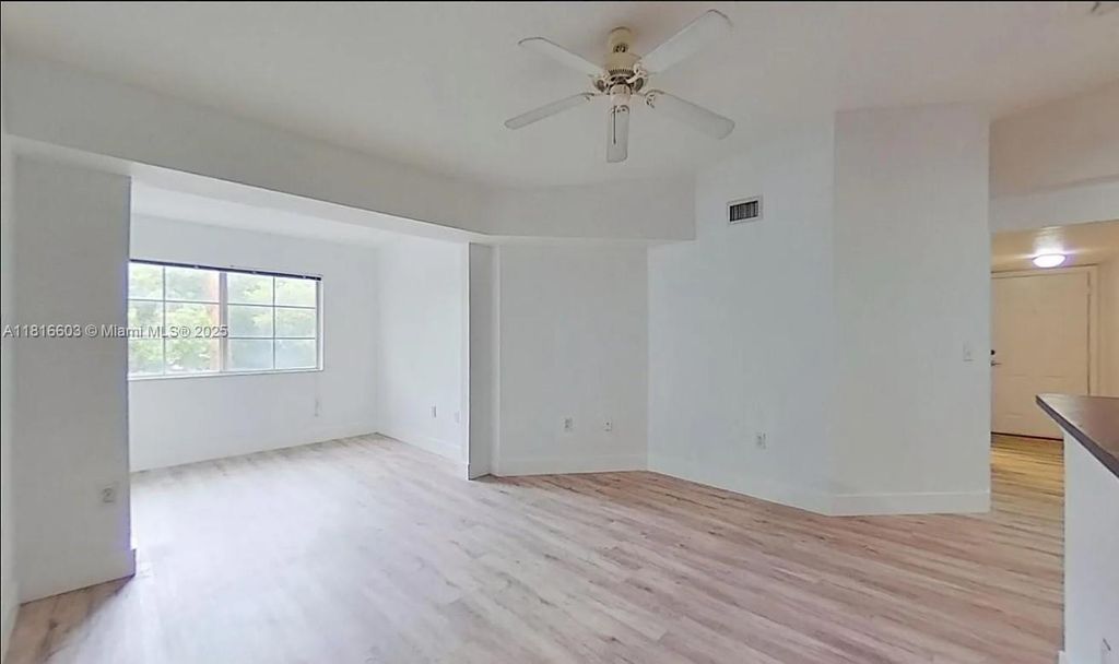 Photo of 2544 Centergate Dr #303, Miramar, FL 33025 (MLS # A11816603)