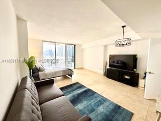 Experience luxury living in this sophisticated 18th-floor studio at iconic Opera Tower. Features floor-to-ceiling windows with breathtaking views, granite countertops, stainless steel appliances, and one full bathroom. Building offers Olympic-size pool, fitness center, 24/7 security, valet service, and covered parking. Located in vibrant Edgewater steps from Margaret Pace Park and Venetian Causeway. Minutes from top dining, downtown, Wynwood's art district, and Miami Beach. This 56-story waterfront tower completed in 2007 offers the perfect blend of luxury and location.
