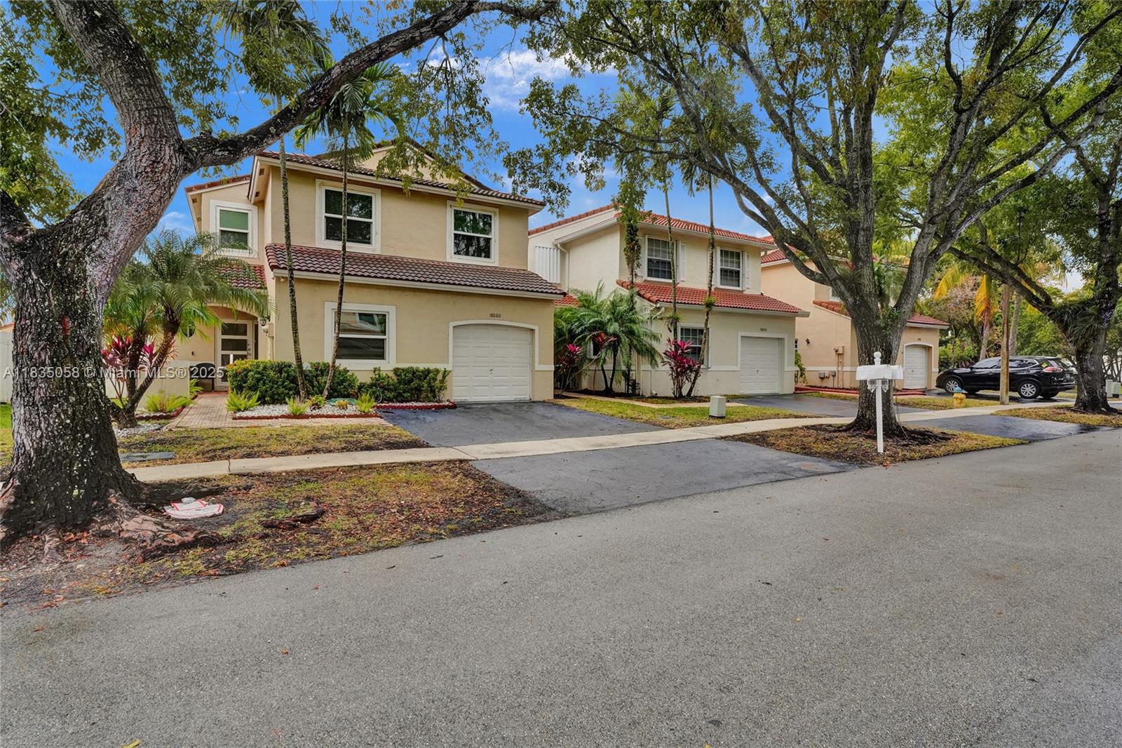 View this beautiful 3 Bedroom 2.5 Bathroom Luxury Home in the sought-after Silver Lakes Community. New Expanded kitchen with exquisite finishing’s, Tile floors, Remodeled bathrooms, Hurricane Impact Windows (2022). Garage has been converted for use as a home office, at buyer’s request and Seller's expense, it will be restored to a fully functional garage—original components remain in place behind drywall. This spacious home is a Gem. Fantastic amenities walking distance to the community pool, playgrounds, cable, high-speed fiber optic internet, and guest parking within walking distance to front door. Just minutes from top-rated schools, supermarkets, restaurants, and entertainment.