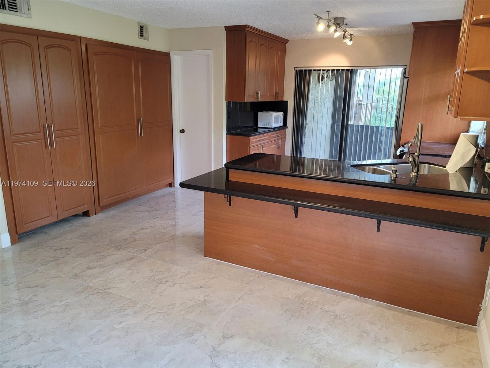 WIMBLEDON AT JACARANDA CO - Residential Lease