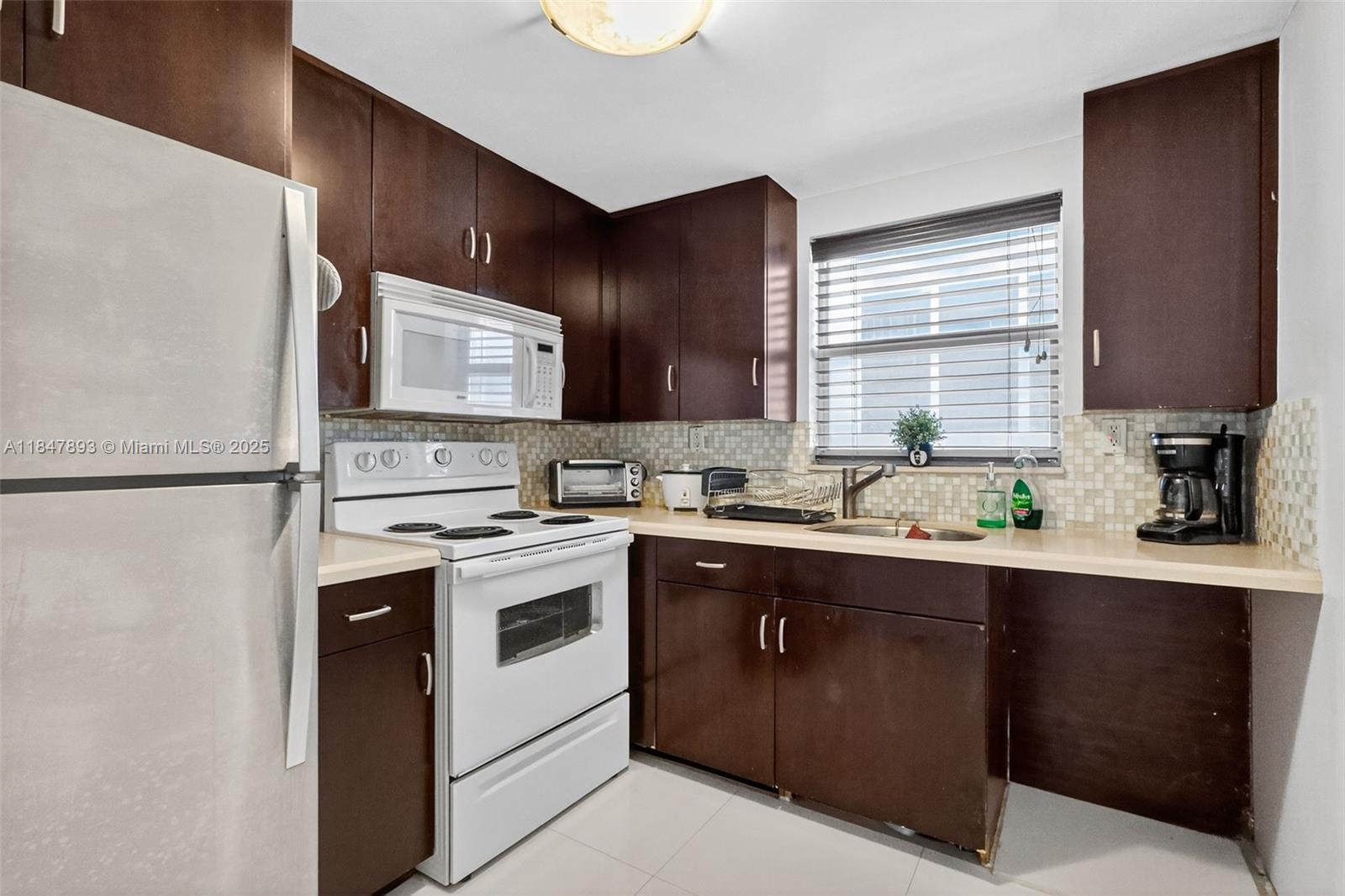 1245 WEST AVE CONDO - Residential