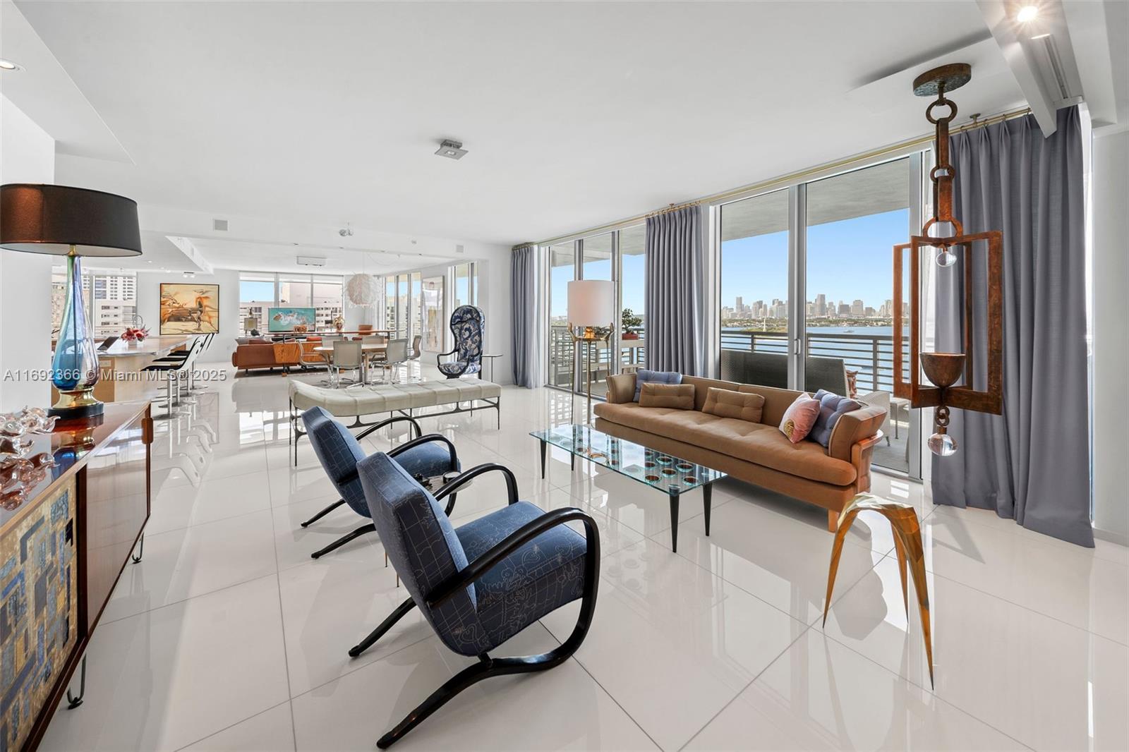 Experience ultimate boutique luxury living from this Upper Penthouse unit. Unobstructed water views from every room of Biscayne Bay with over 160 feet of western water frontage and wraparound terraces. Custom designed Penthouse by the original owner with almost 3000 square feet of internal living space in addition to 4 terraces offering complete privacy. A massive living room, dining area and family room makes for gracious entertaining spaces. Large chefs kitchen with butlers pantry completes the package. This unit comes with dedicated garage parking. Capri South Beach Marine Grande Tower is a full service building with concierge, valet parking, private marina, on-site manager, and ideally located 2 blocks to Sunset Harbour, The Standard Hotel, and Lincoln Road.