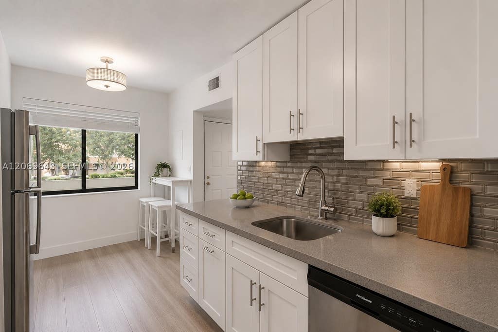 Photo of 185 Lakeview Dr #201, Weston, FL 33326 (MLS # A12069643)