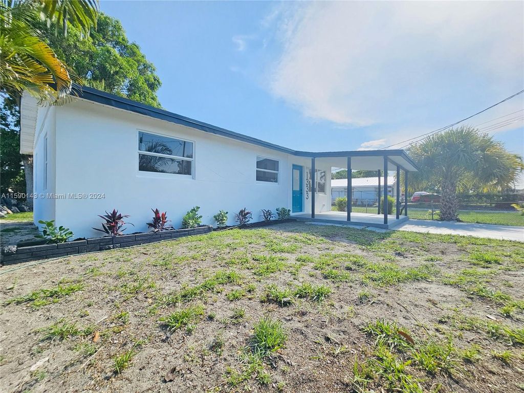 Photo of 1333 Ac Evans St, Riviera Beach, FL 33404 (MLS # A11590143)