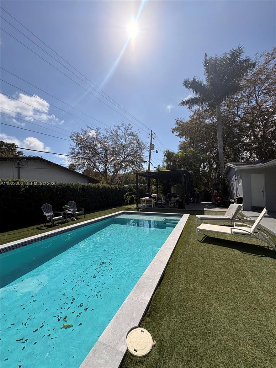 This beautifully maintained single-story Mid-Century Modern home offers over 2,000 sq ft of living space in a classic Florida ranch-style design. The spacious layout includes a bright, open living room with sliding doors that overlook a large backyard and pool area, a light-filled kitchen, four bedrooms, two full bathrooms, a separate laundry room, and an attached garage.

The property is equipped with 47 solar panels, offering significant energy efficiency.

Investor opportunity: The home is currently tenant-occupied through 03/31/2026, with the tenant paying $5,500 per month and willing to renovate for another year.

Please note: Showings only on wednesday from 2pm to 4pm with 24 hours advance notice . A video tour is available upon request.