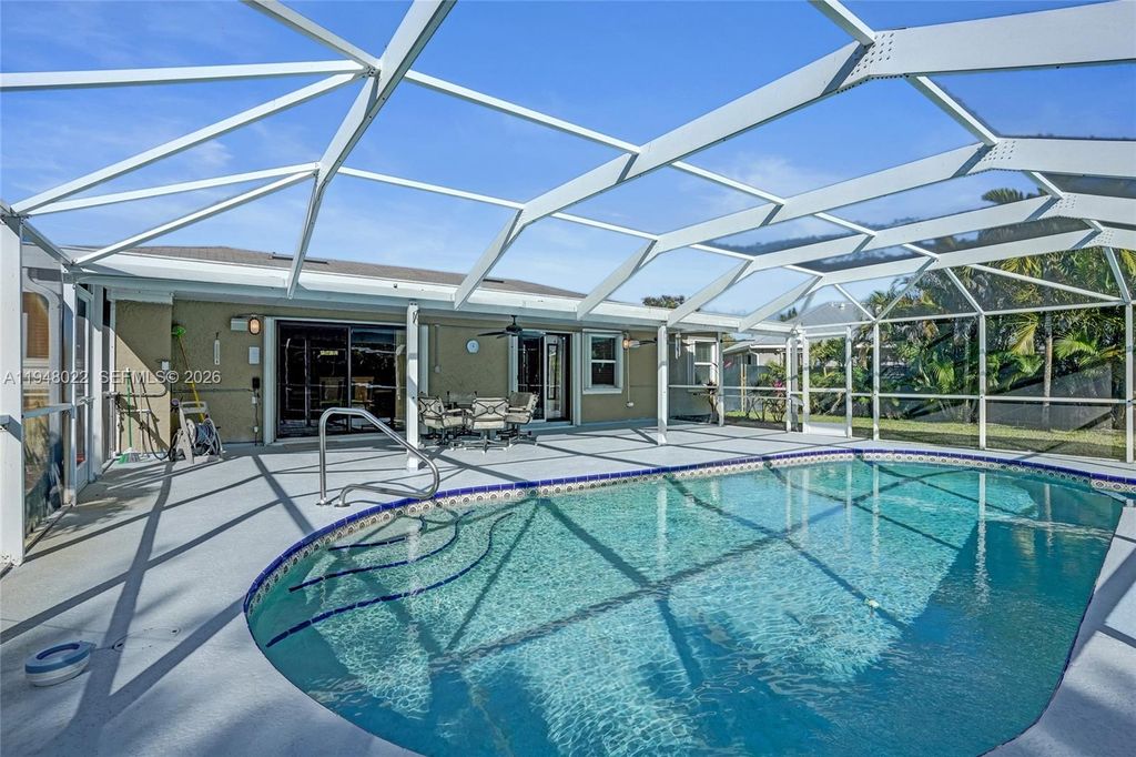 Photo of 2252 SE Rainier Rd, Port St Lucie, FL 34952 (MLS # A11948022)