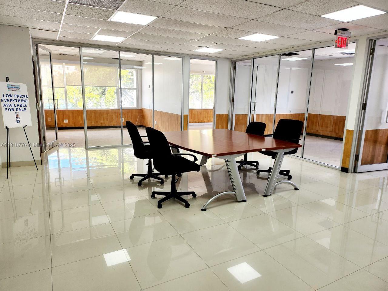 A spacious office suite in one of Miami’s most strategic locations!
This bright and expansive second-floor unit (walk-up, no elevator) includes 8 private offices, 2 large rooms perfect for additional offices or storage, a generous open area ideal for setting up a conference room or extra workstations, and an exclusive private zone with a kitchen and a full bathroom — a perfect fit for a company that value both comfort and functionality.
Large windows, enhanced by glass partitions, porcelain tile floors, and LED — creating a modern and inspiring work environment. 24/7 access, security system, and 4 covered parking spaces included.
Located on the world-famous Calle Ocho, just one block from I-95, and minutes from Downtown Miami and Brickell City Center — an unbeatable location.